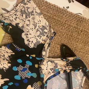 Dress with cut away shoulders